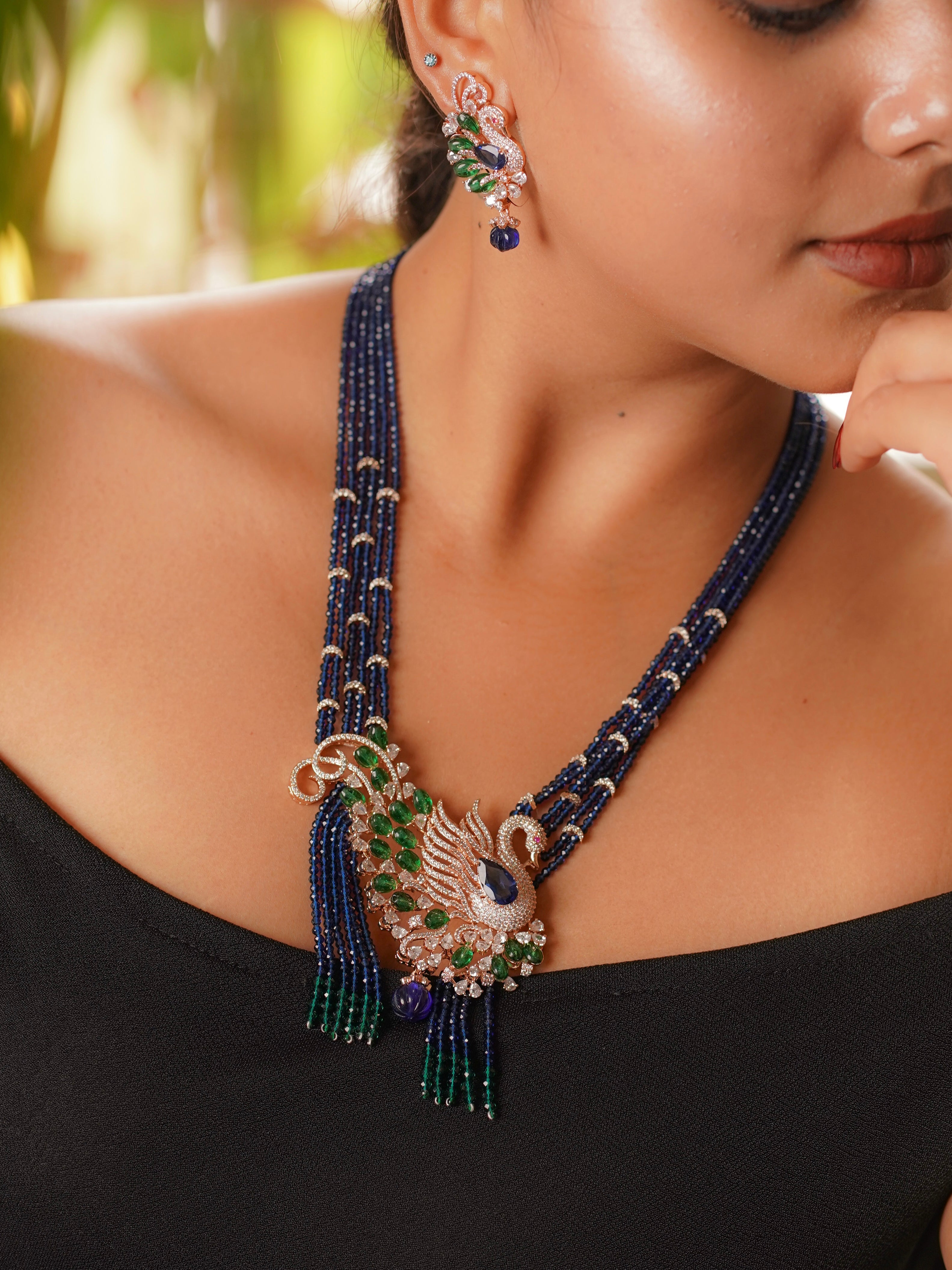 peacock birdstone necklace with gemstone beads and fine detailing in micron gold finish